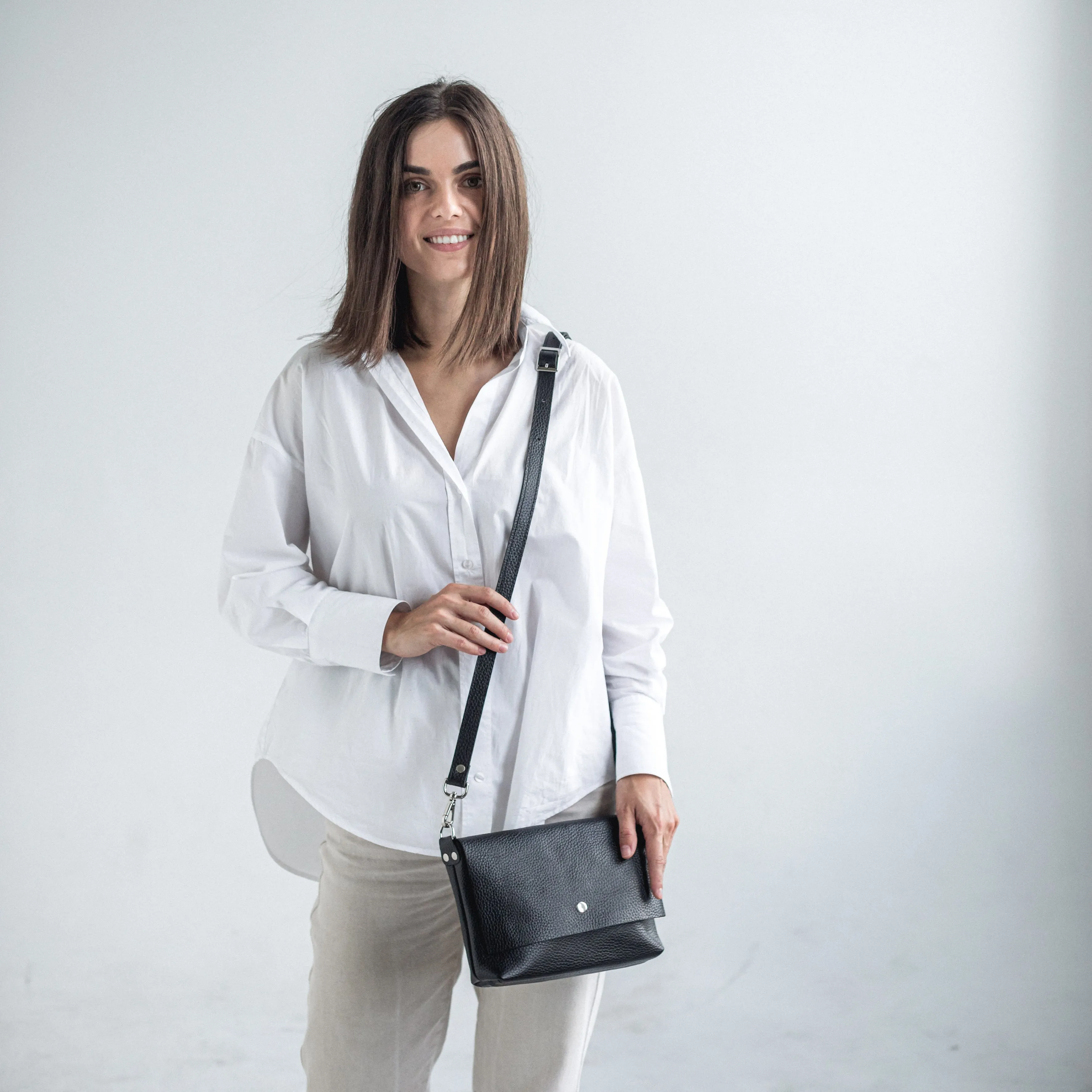 Black pebbled leather crossbody bag