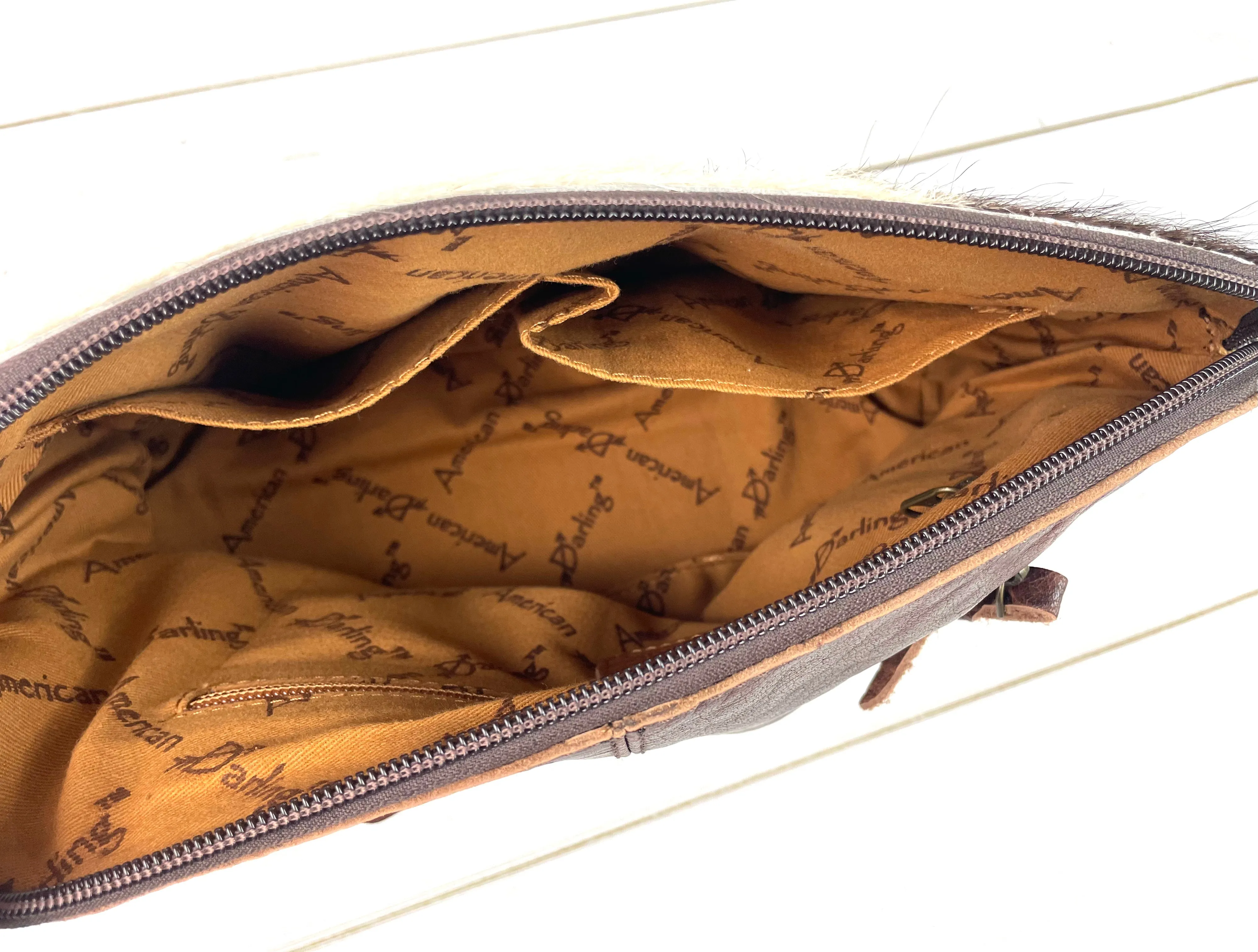 Brown Cowhide and Leather Floral Tooled Bottom Zipper Western Handbag