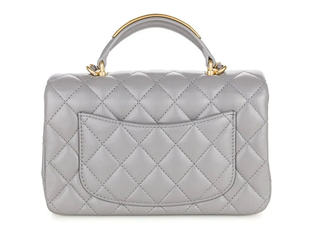 CHANEL 22B Grey quilted Lambskin / Antique Gold Metal Logo Top Handle Mini Flap Bag