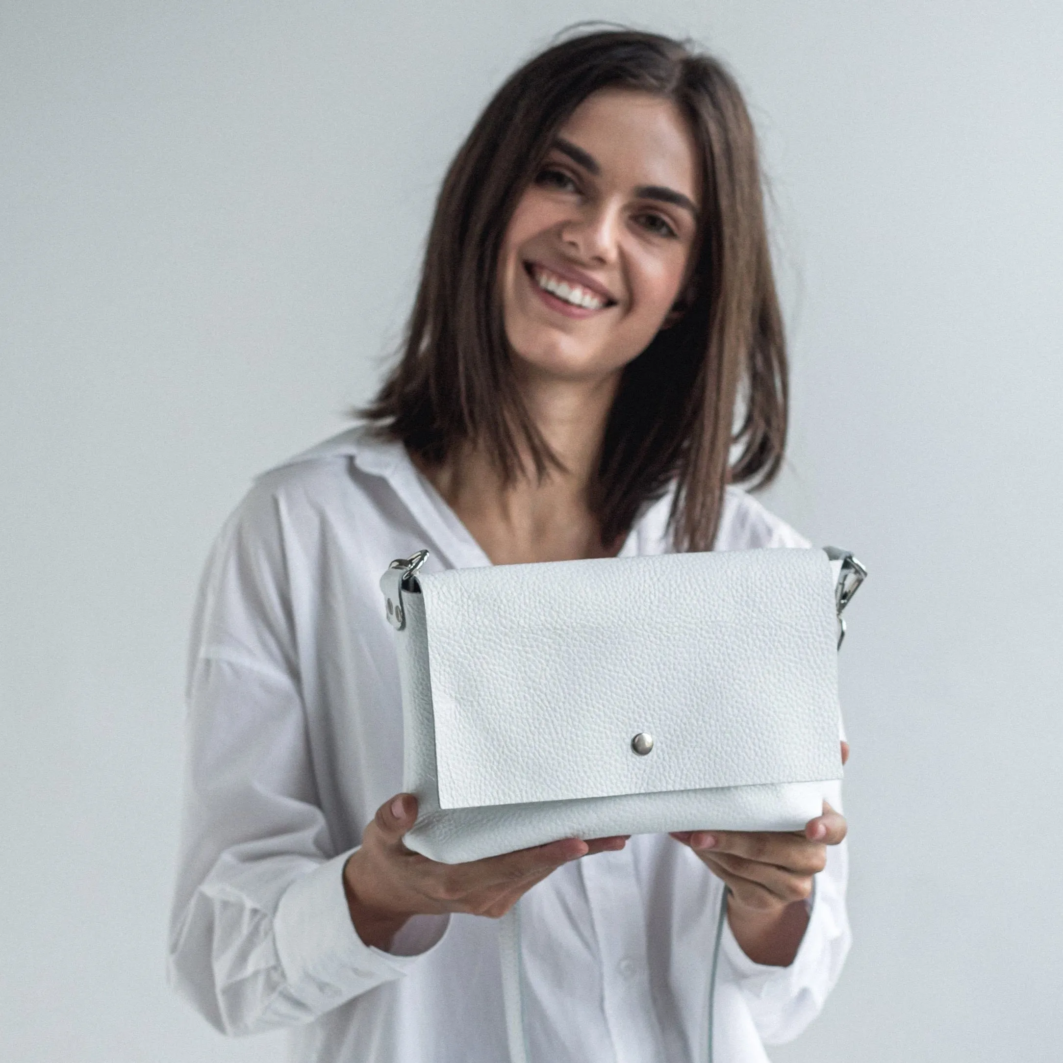 White pebbled leather crossbody bag