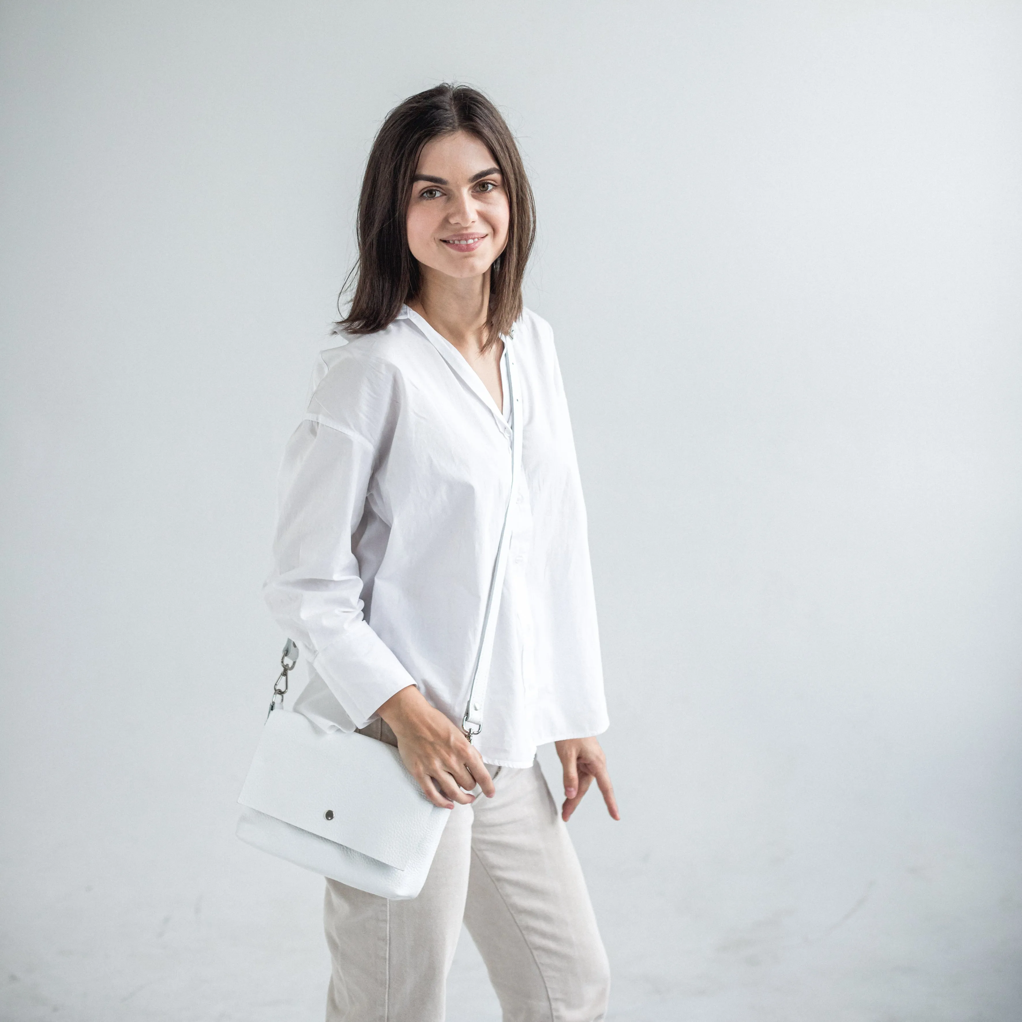 White pebbled leather crossbody bag