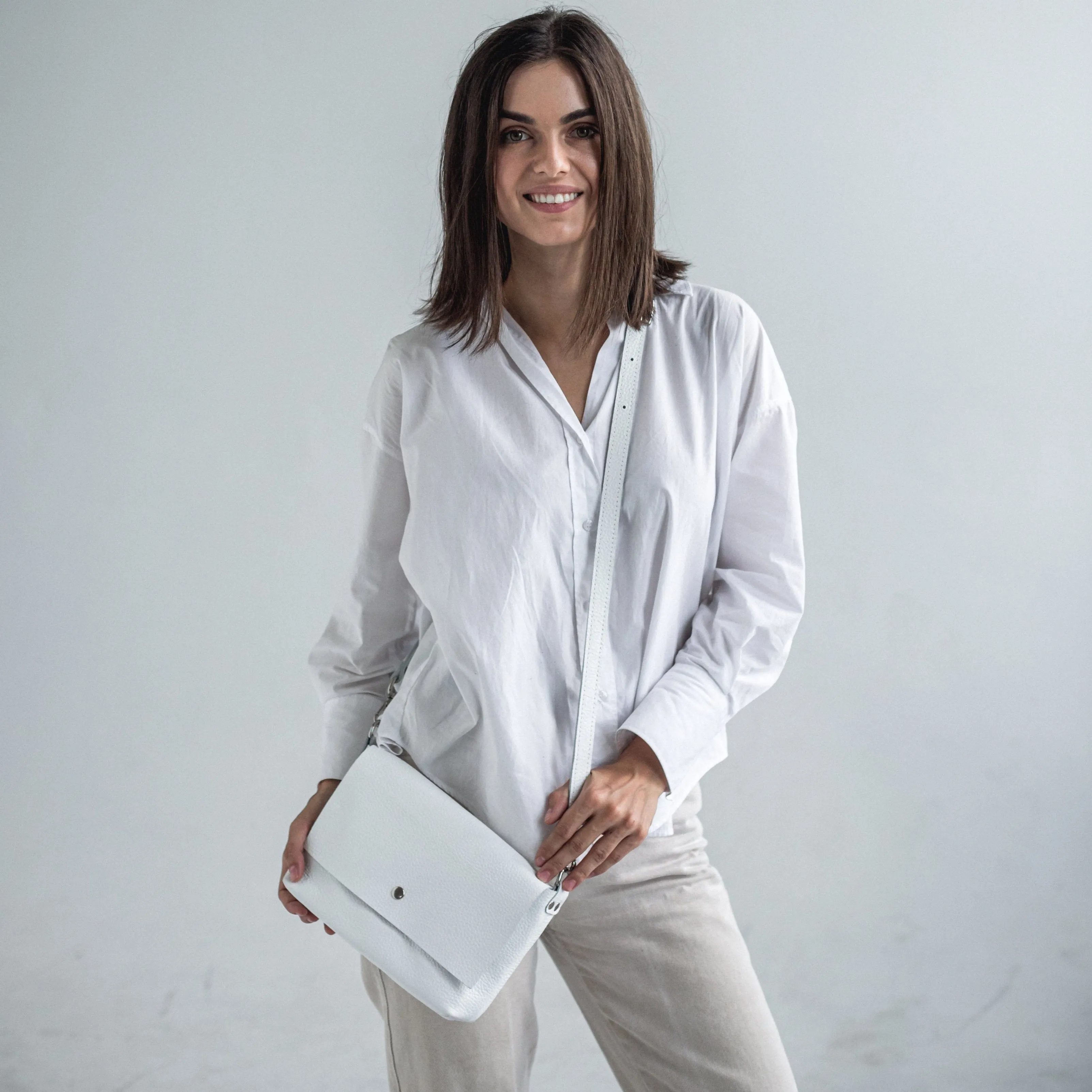 White pebbled leather crossbody bag