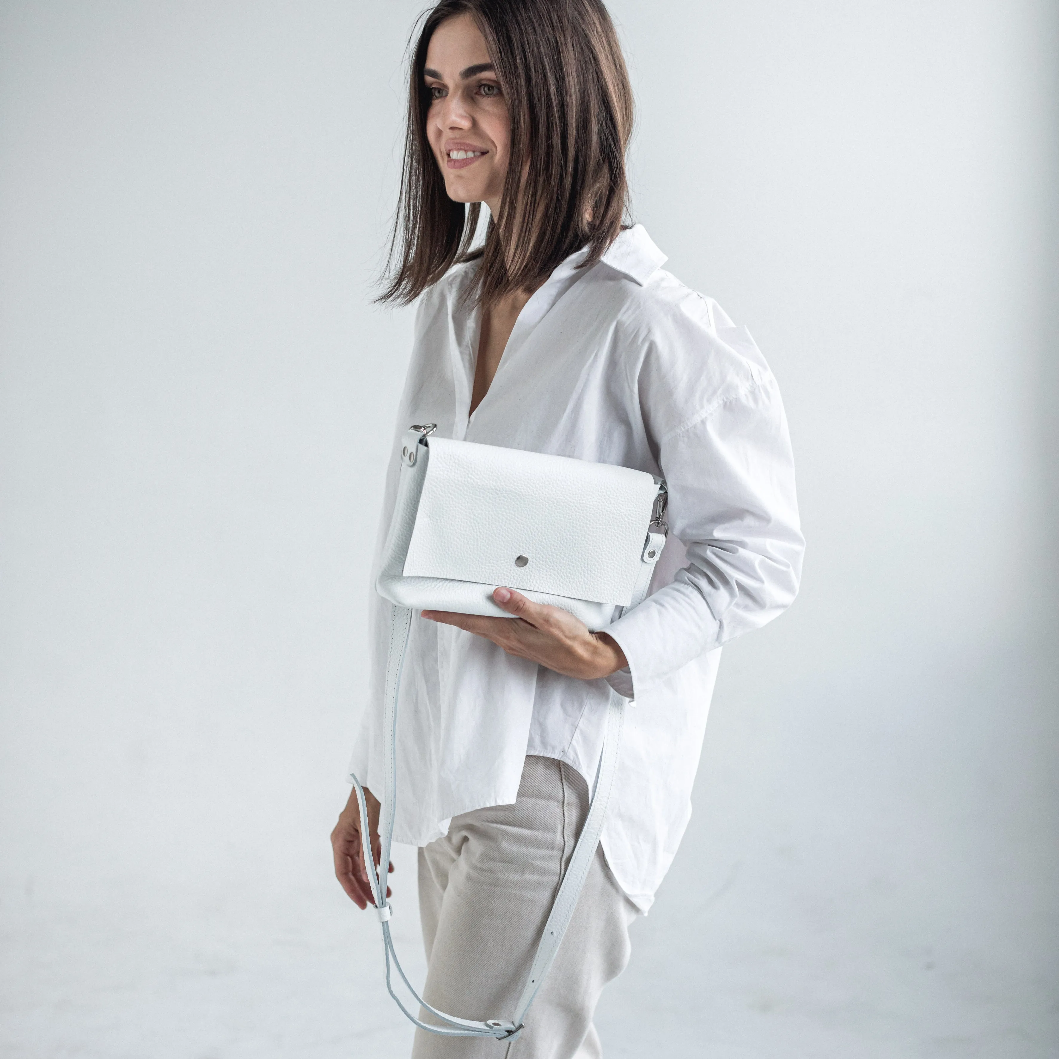 White pebbled leather crossbody bag